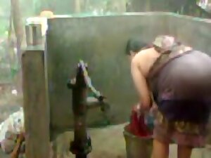 big beautiful woman indian bhabhi taking shower from pump
