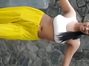 Captivating and sexy cutie dancing in her hot outfit shaking her booty