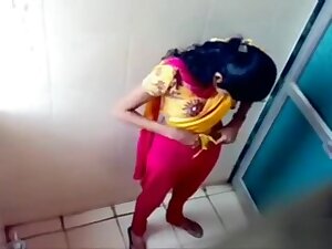 Indian coed girls get caught on tape using the university toilet