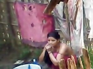 Topless Indian wife washes herself